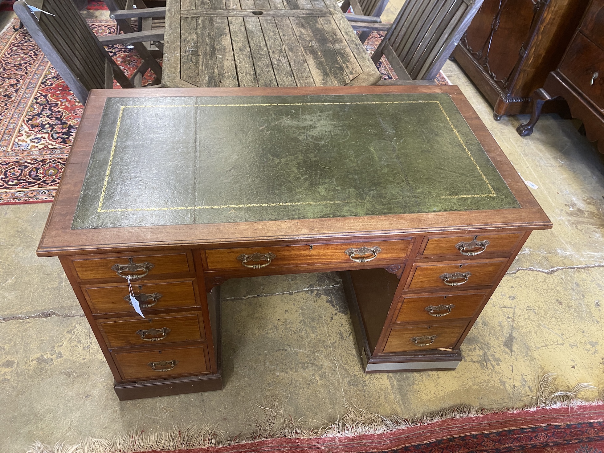 A late Victorian mahogany kneehole desk, length 122cm, depth 68cm, height 77cm